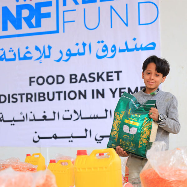 Noor Relief Fund Food Basket Noor Relief Fund | Boy with Food Basket